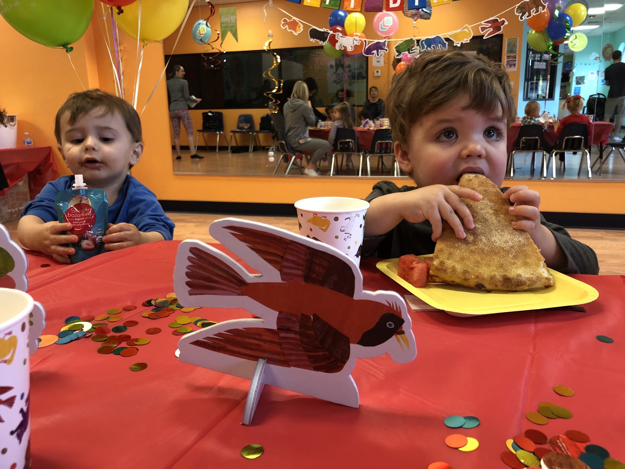 Ben tries pizza for the first time at a birthday party.