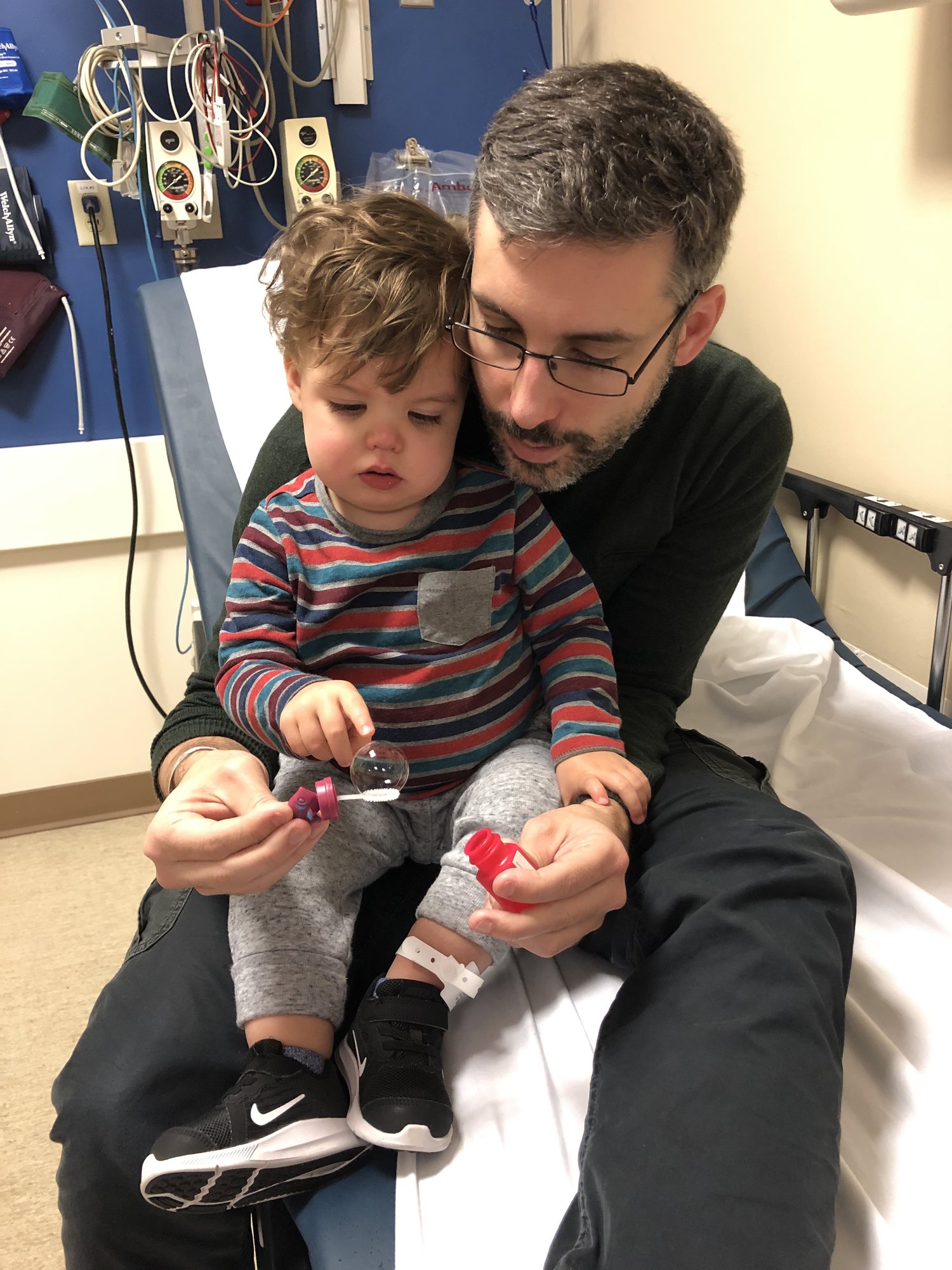 Fun with bubbles in the ER. He's feeling better at this point :)