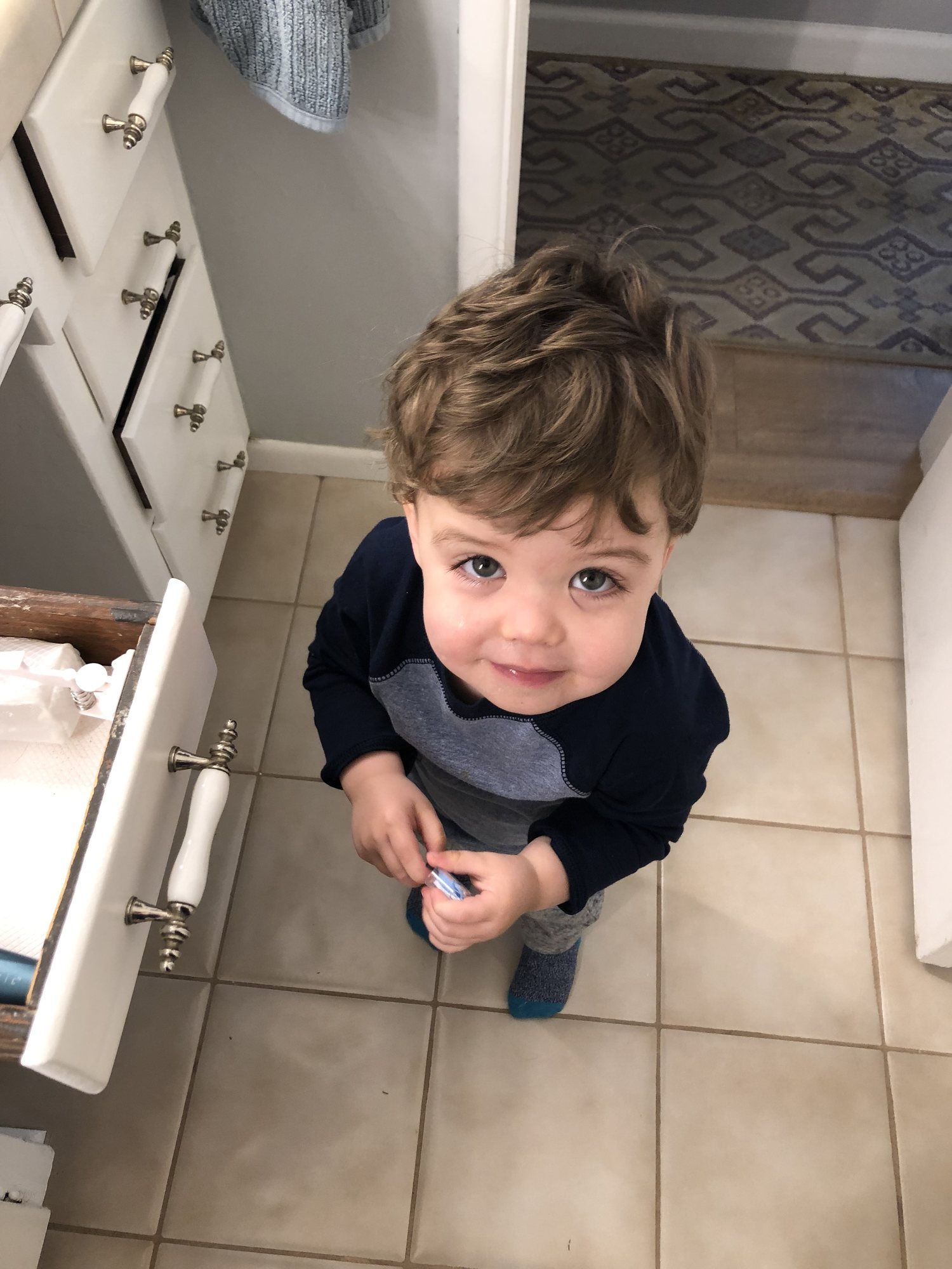 How do I resist that look? He's probably asking to brush his teeth for the 10th time that day.