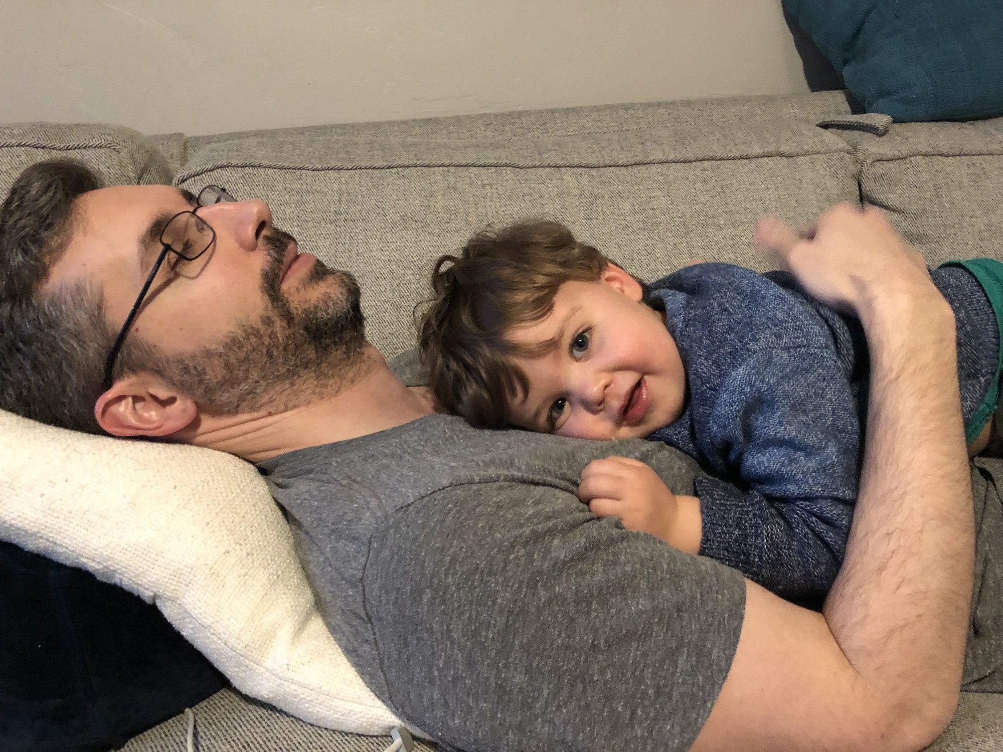 Taking a snooze with Dada.