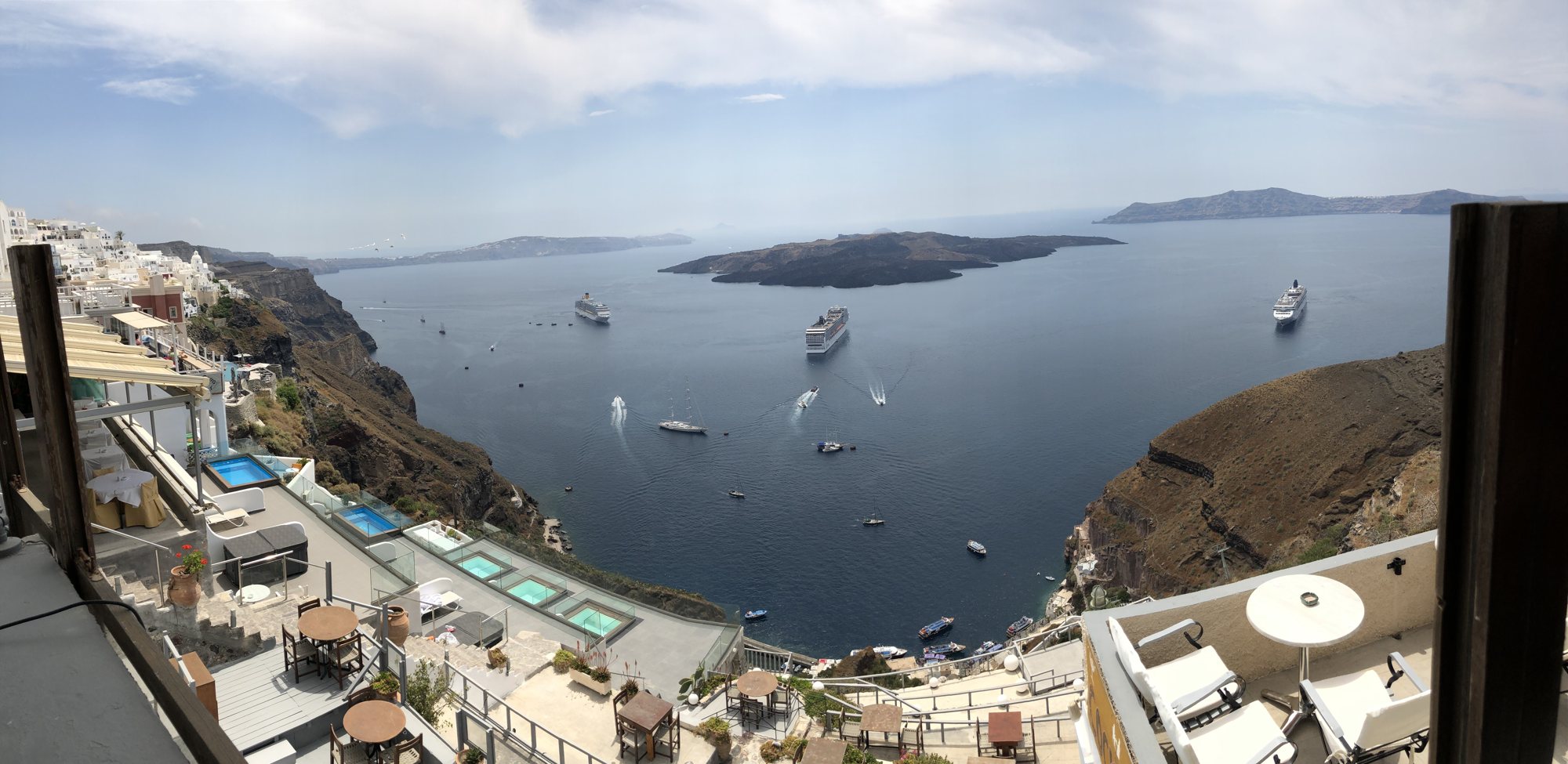 View during a drink break in Thira, Santorini. The island in the center is the newly-forming volcano.
