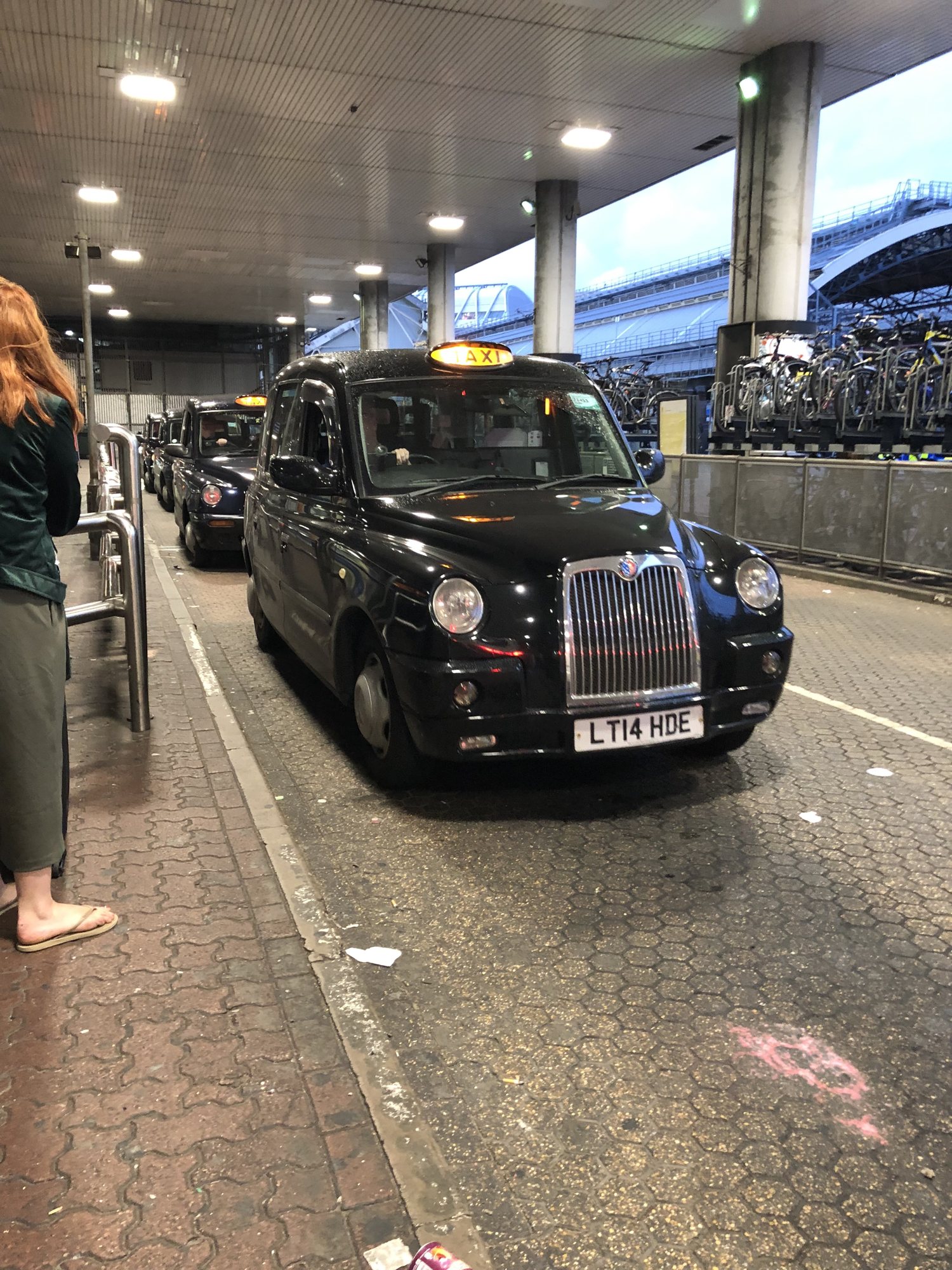 Grabbing a taxi in London. We had the BEST taxi driver (second in line in the pic). He didn't charge us to go a bit out of the way to see Windsor Palace, Big Ben and the Eye of London.