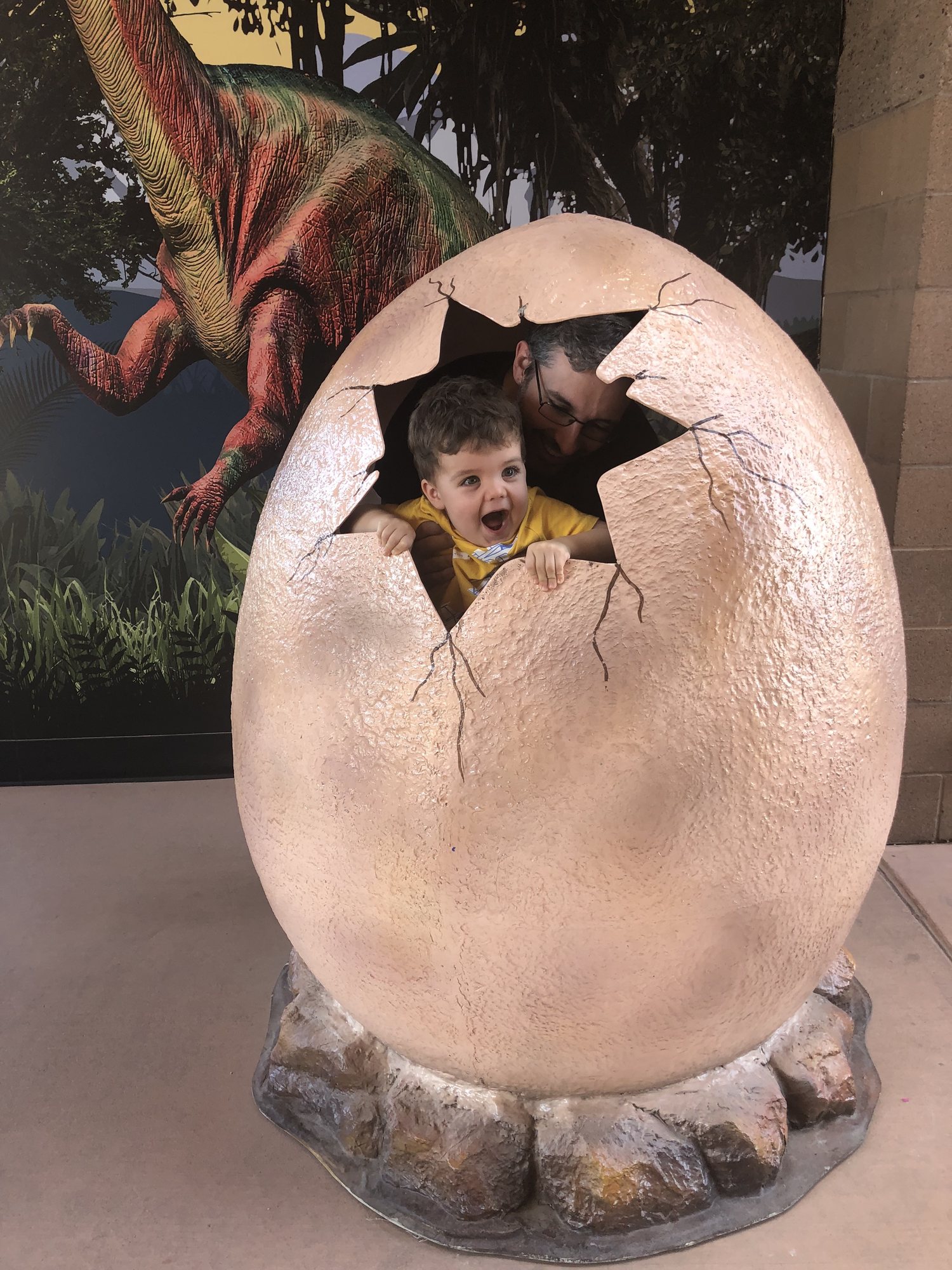 Ben hatching from a dinosaur egg! RAWR!