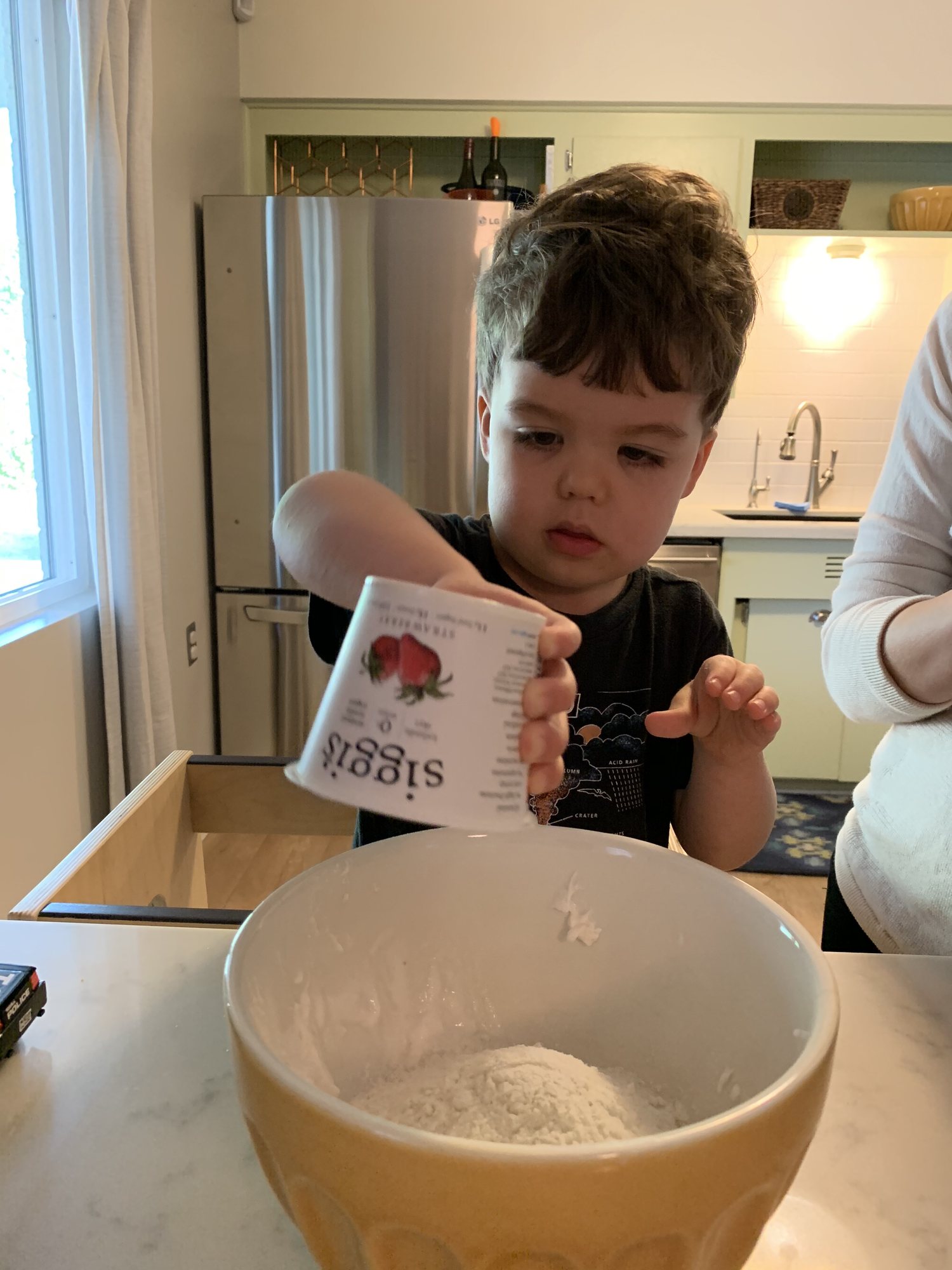 Baking a french yogurt cake for dad. This is the face Ben makes when he's really concentrating :)