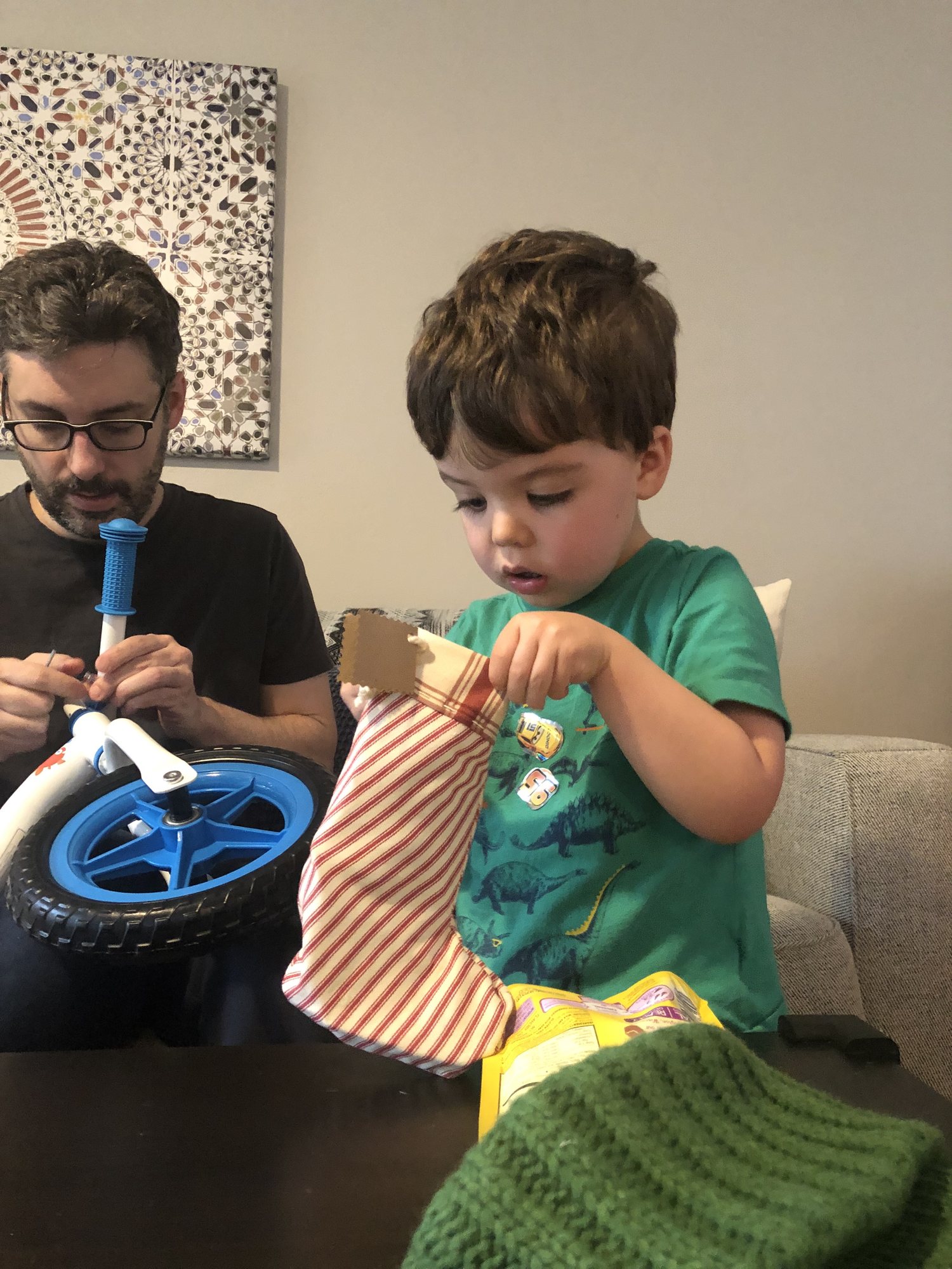Opening his stocking from Mema!
