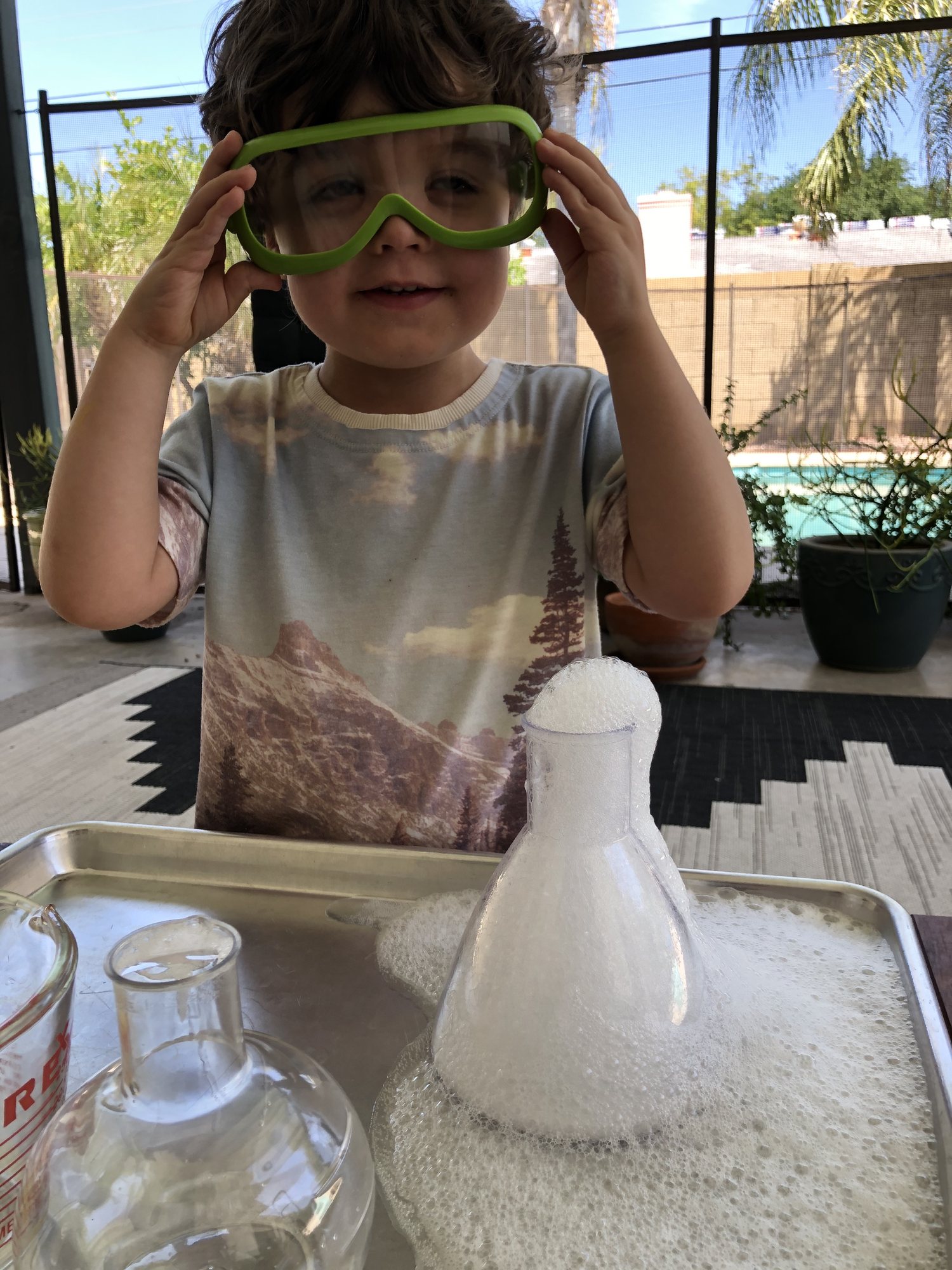 Volcano time! Trying out the lab kit from Grandma TT and Grandpa Stan. Thanks guys!!!