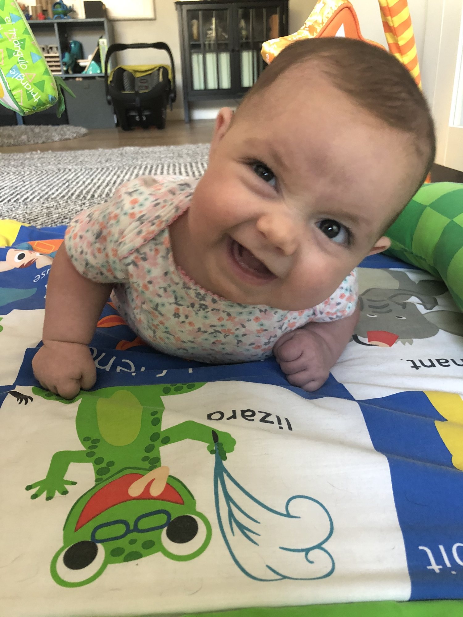 Unlike Ben, she enjoys tummy time!