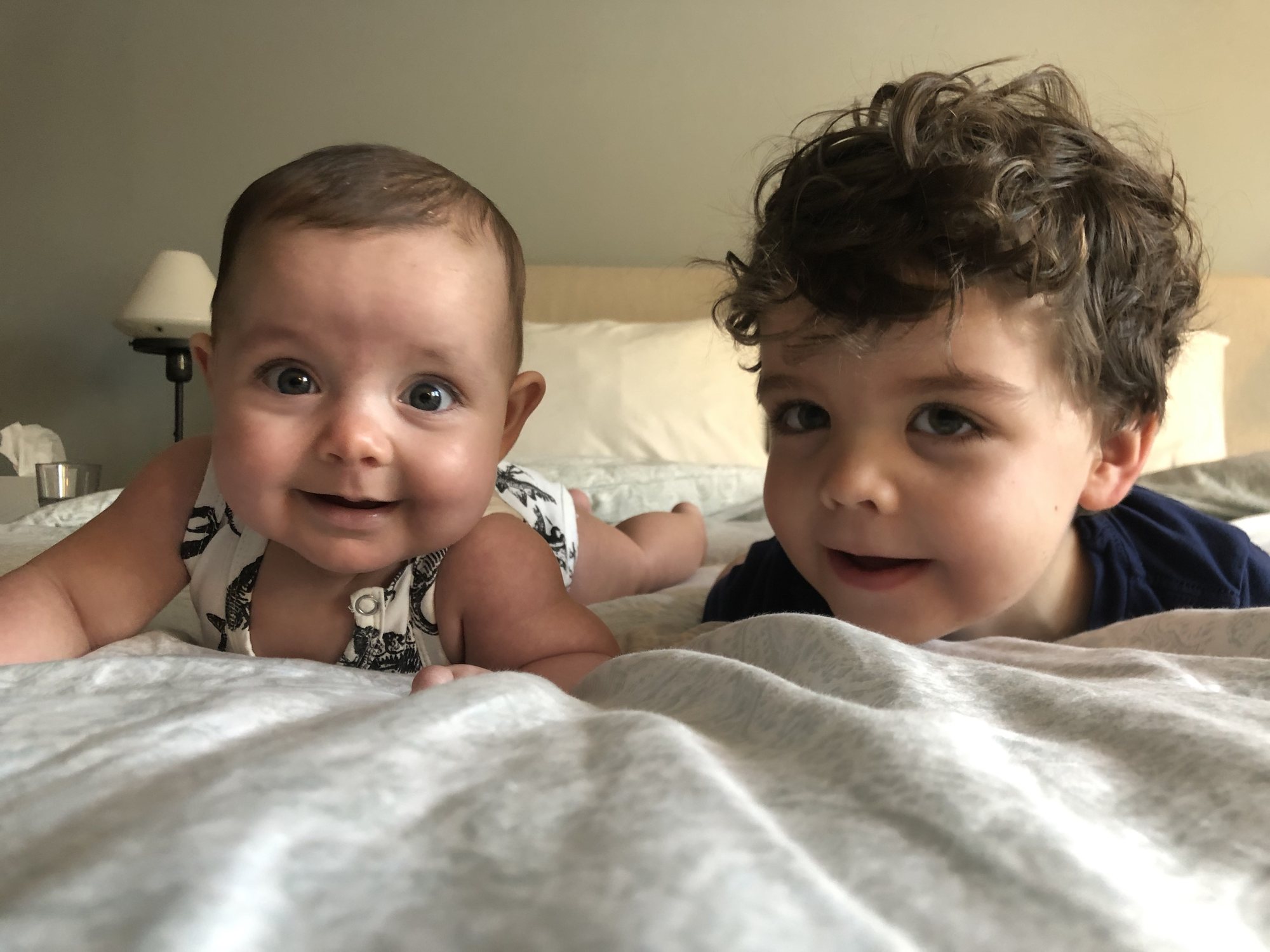 Besties hanging out on the bed