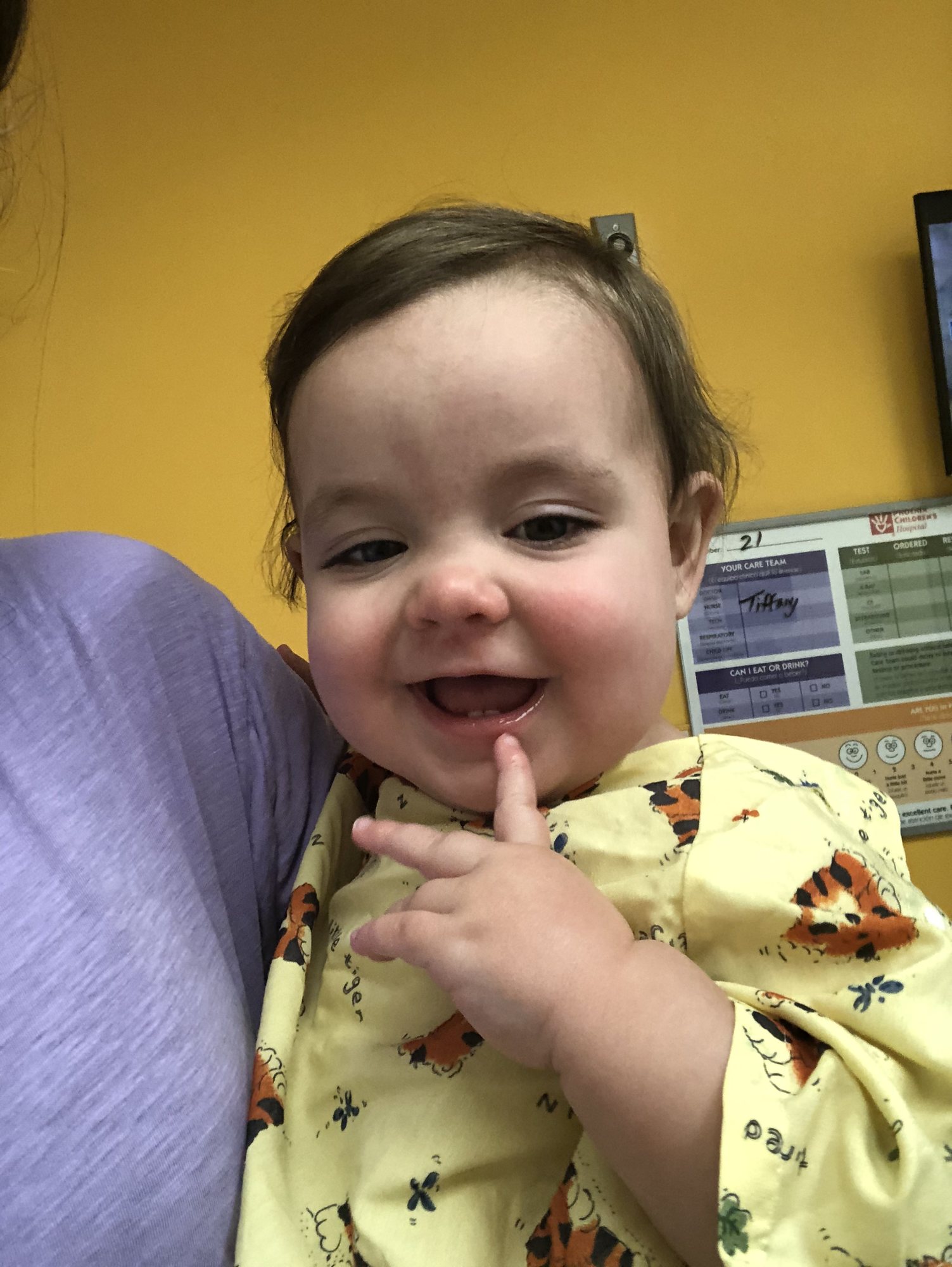 Nora ready for a chest x-ray in the emergency room.