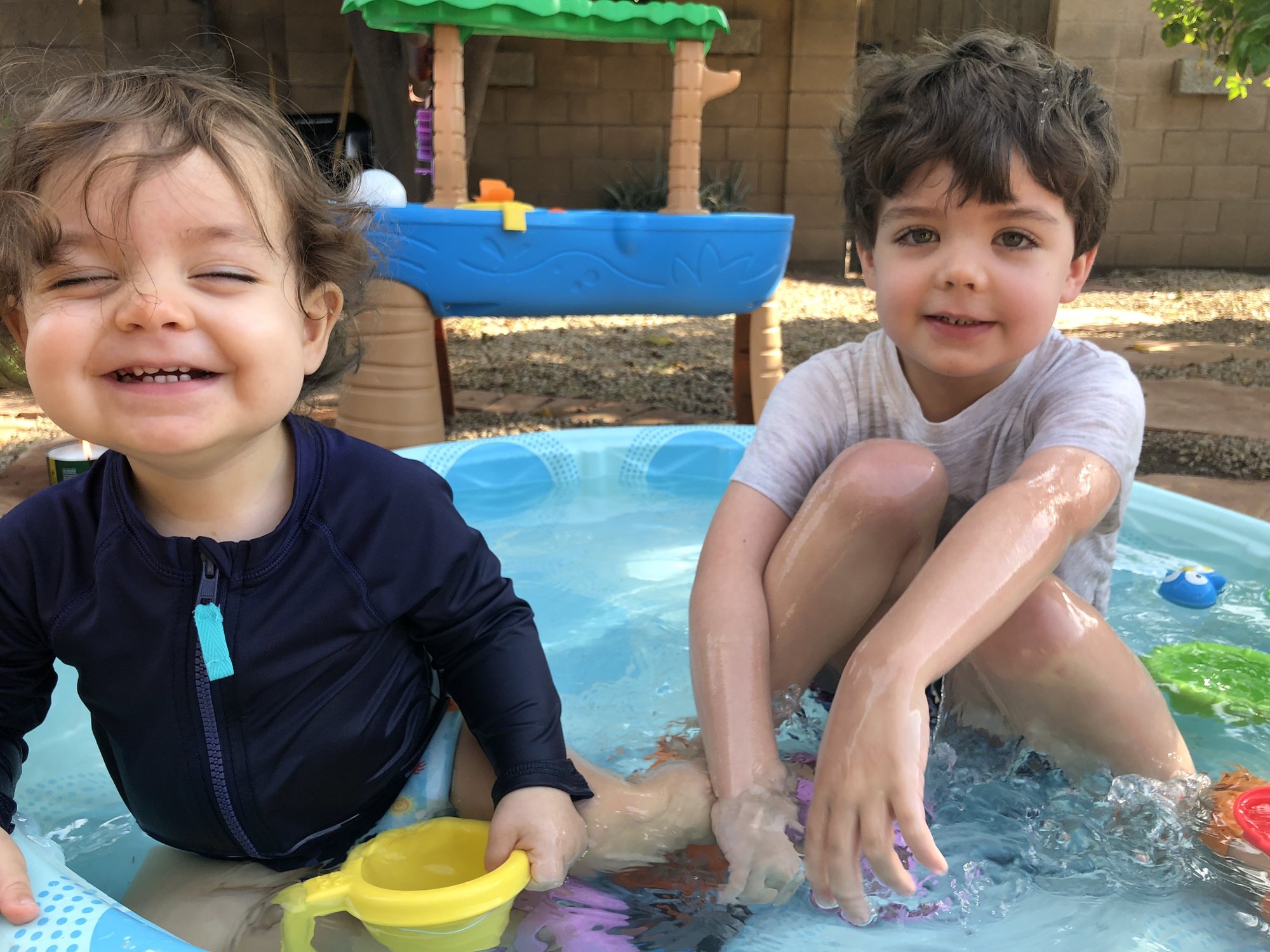 Nora's typical smile in response to "say cheese!"
