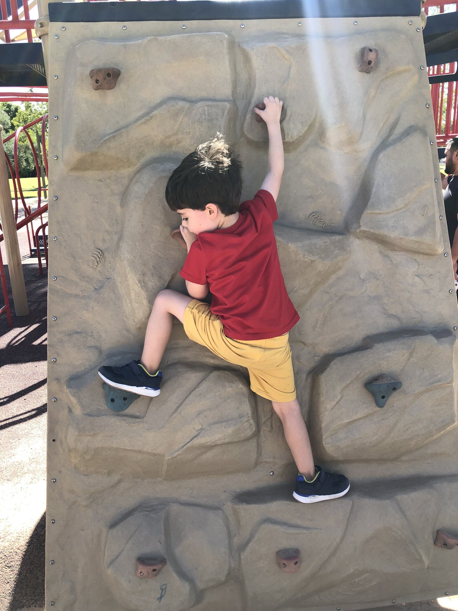 Climbing the rock wall