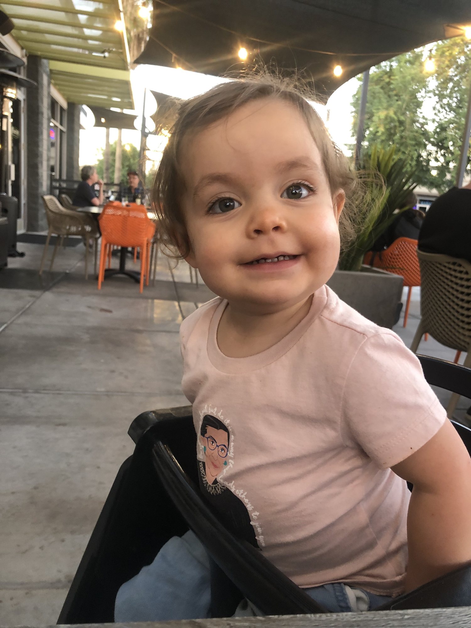 Dinner with Aunt Debbie and Uncle Joe. She wore her RGB shirt just for Aunt Debbie.
