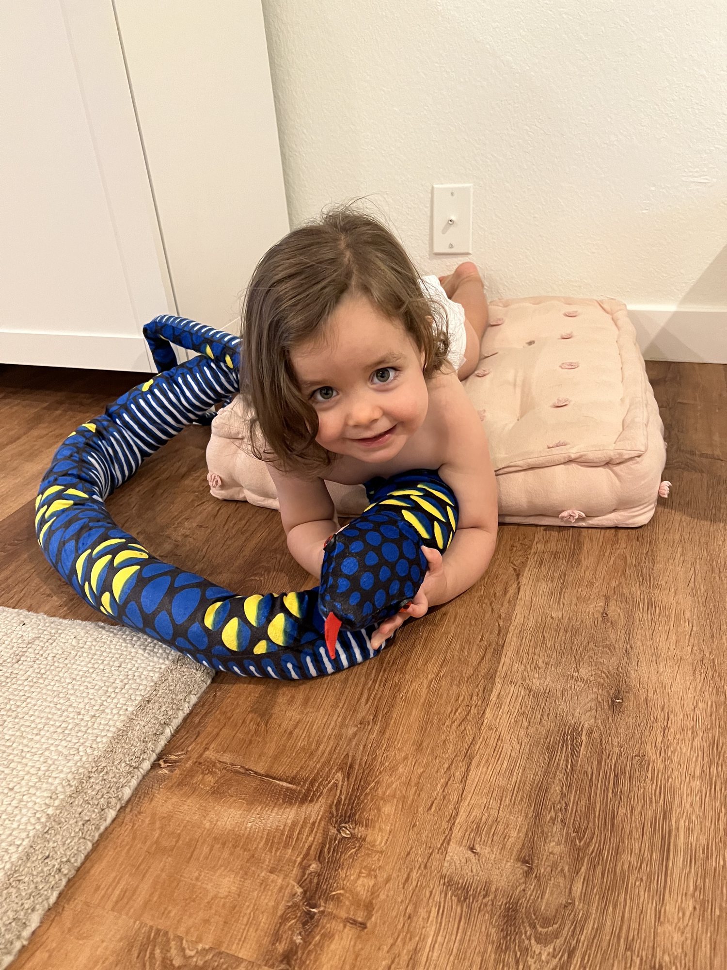She loves her snake from Aunt Debbie and Uncle Joe!