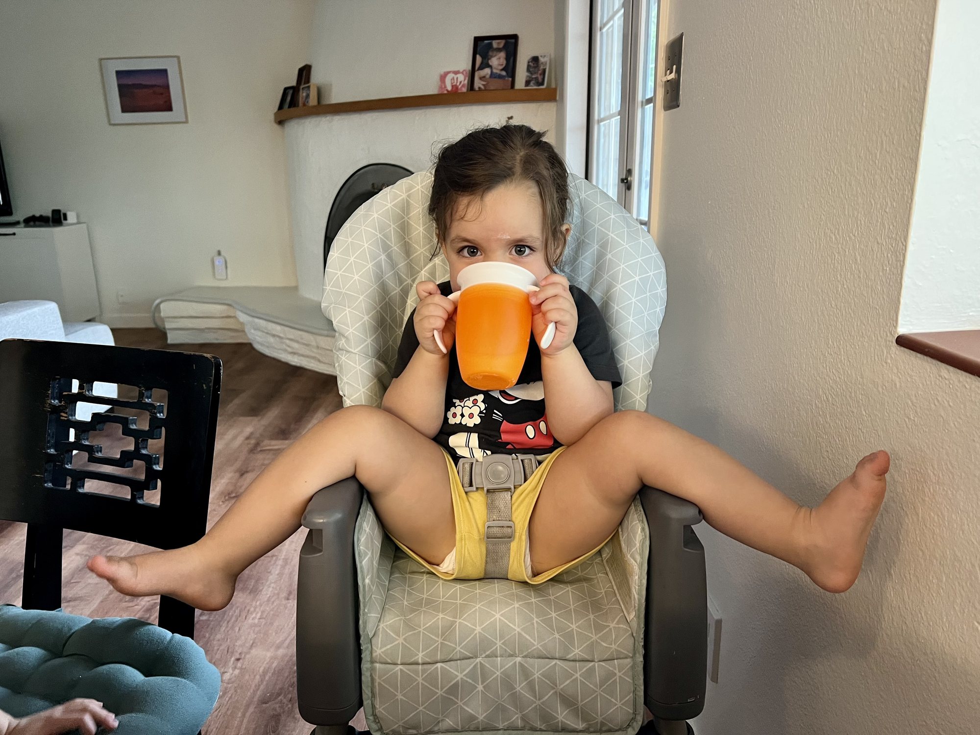Nora's preferred way to sit at the table (LOL).