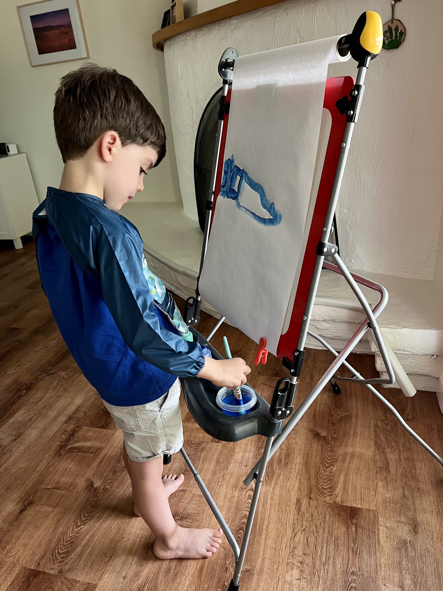 Ben got an easel from one of our neighbors and painted some pictures for us! I believe this was a whale or dolphin (?)