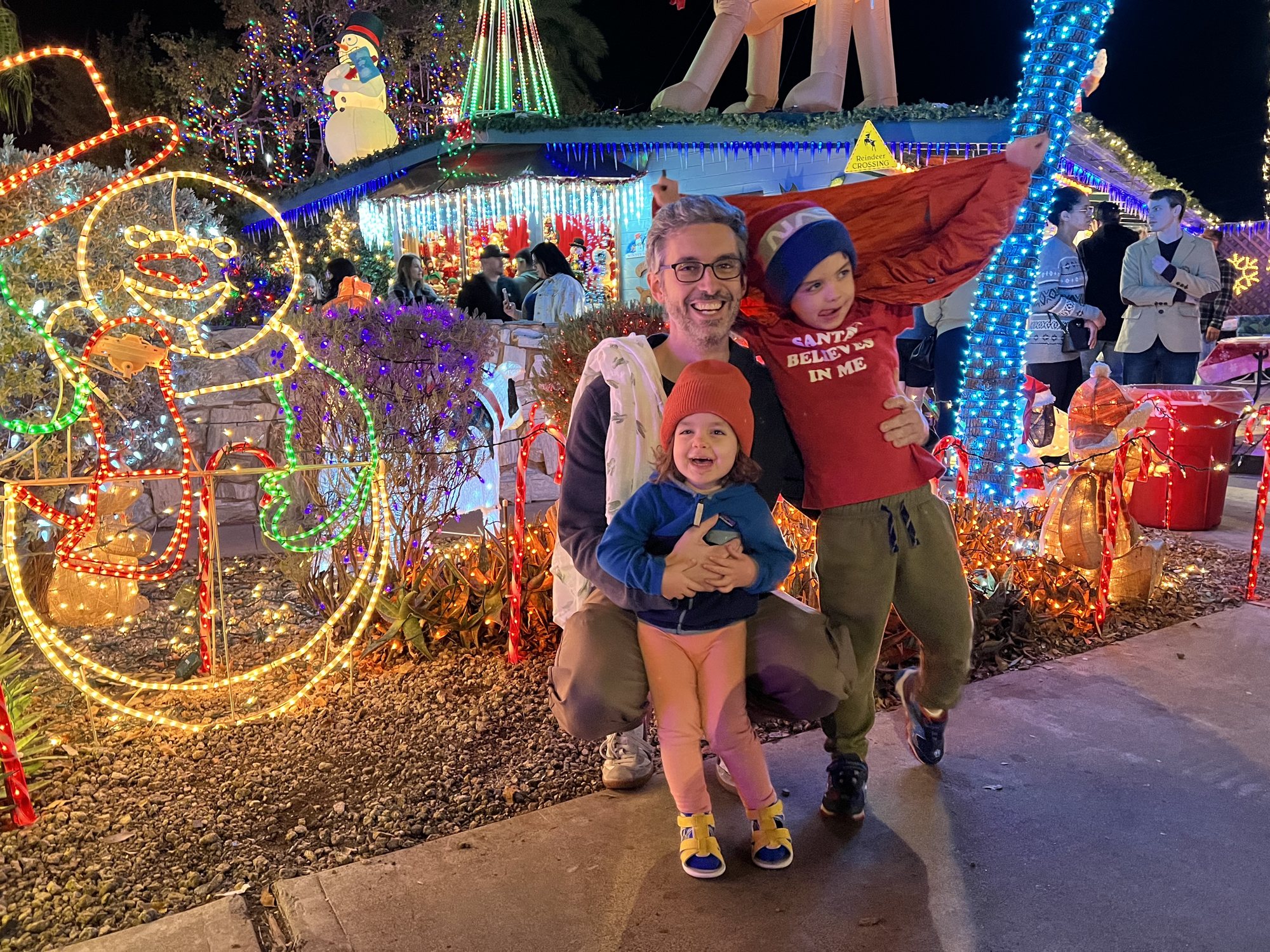 Now she's awake!!! We love visiting this house every year. They sell hot chocolate and even have a bubble machine!