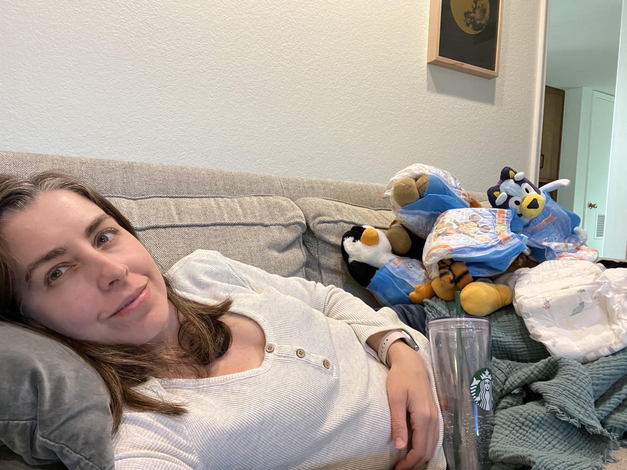 Super Bowl!!! Instead of watching, the kids decided to cover me in diapered stuffies. At this point I was blissfully ignorant of the giant pile of stuff that was forming in Nora's room. LOL.