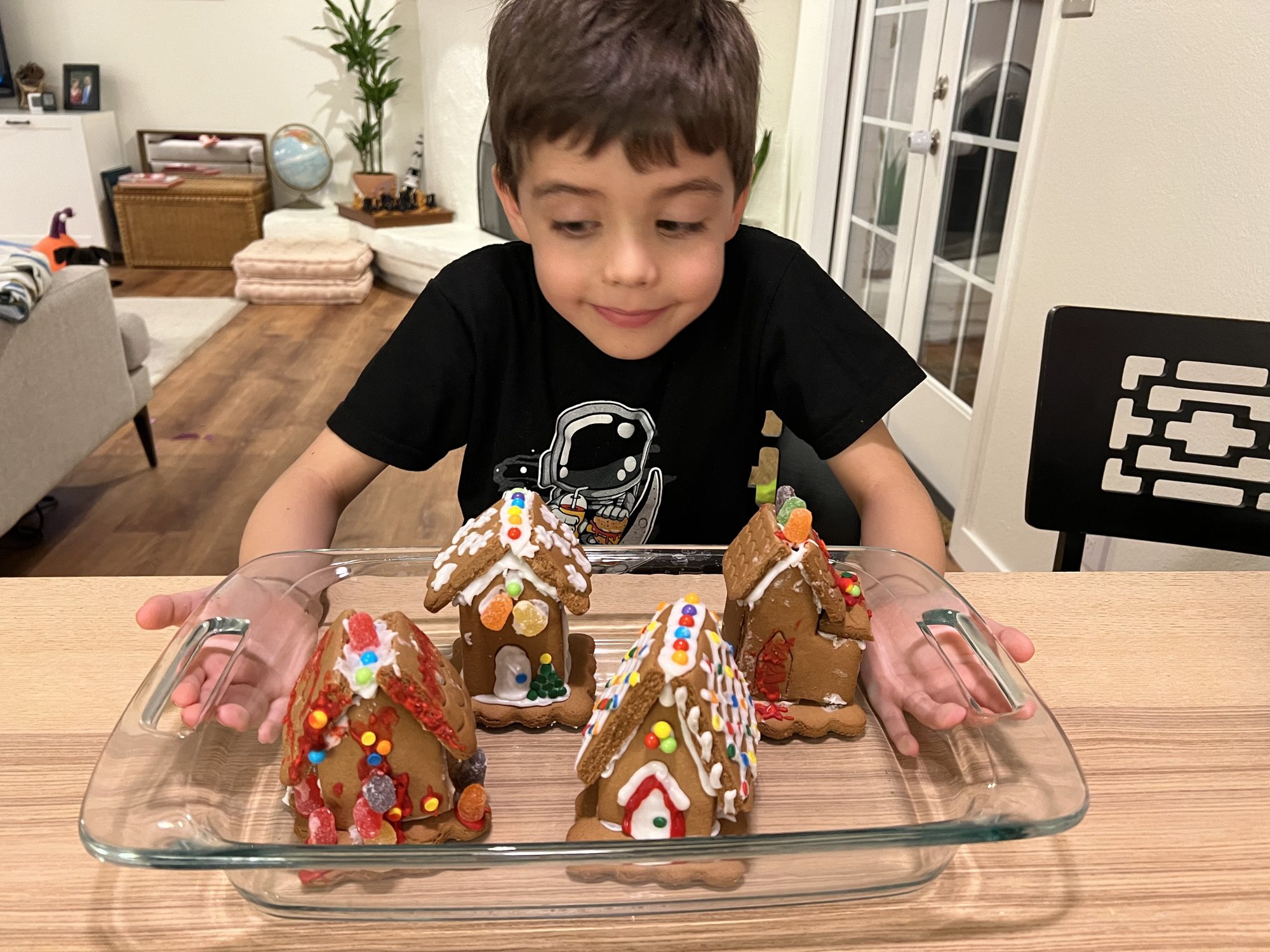 I didn't get a picture of her making them, but Aunt Debbie did a killer job putting the gingerbread houses together this year!