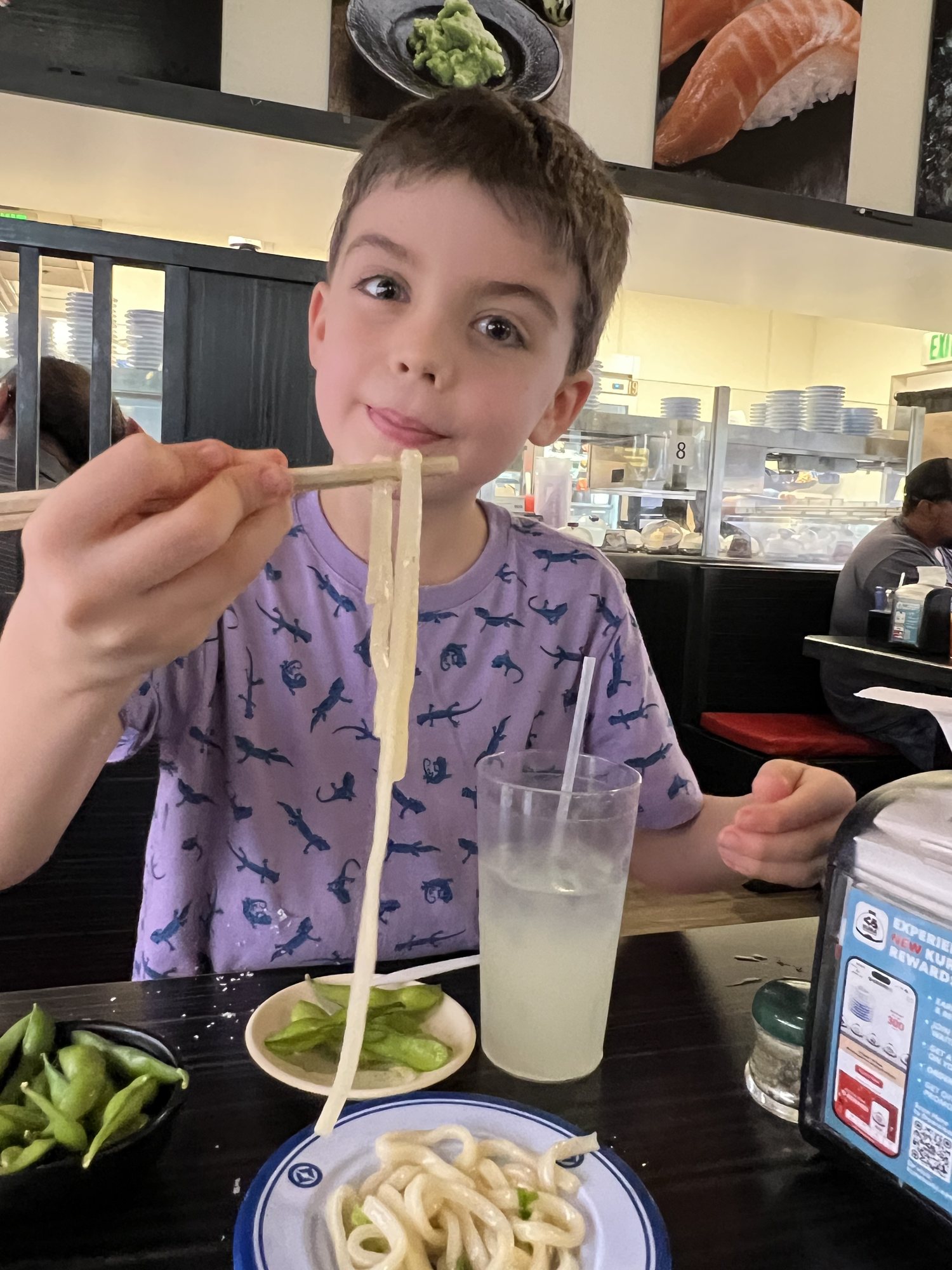 Starting to get better with chopsticks.