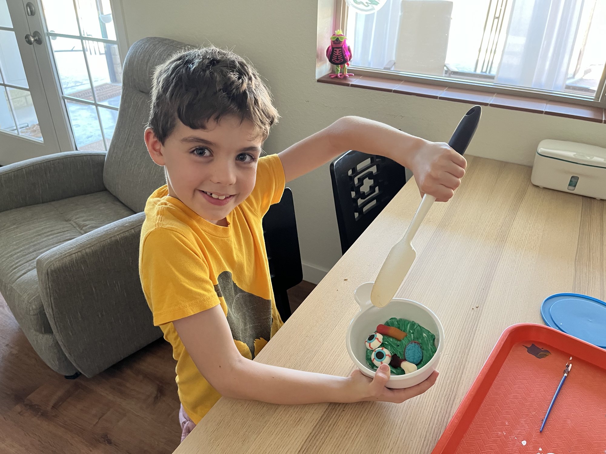 Ben making some Halloween goo/candy thing.